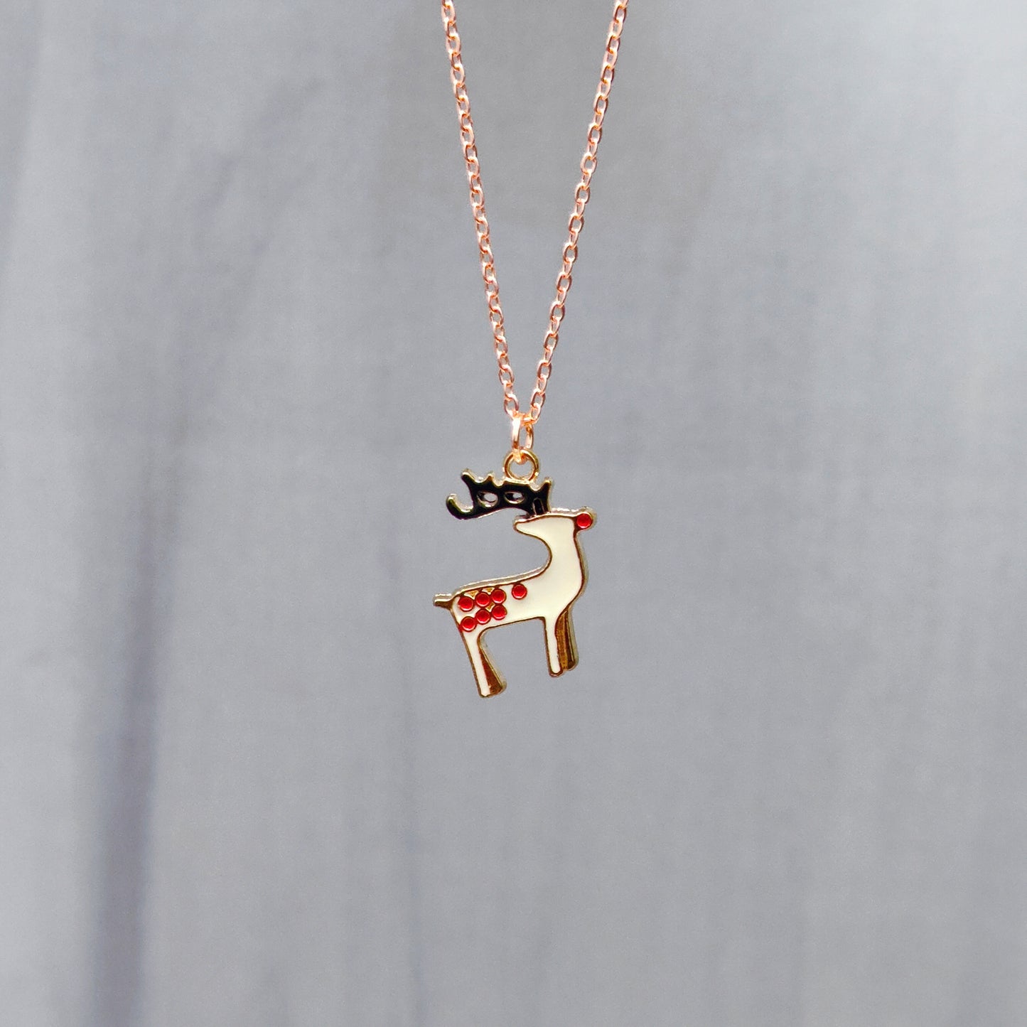 Spotted Reindeer Rose Golden Christmas Pendant Set (Necklace & Earrings)