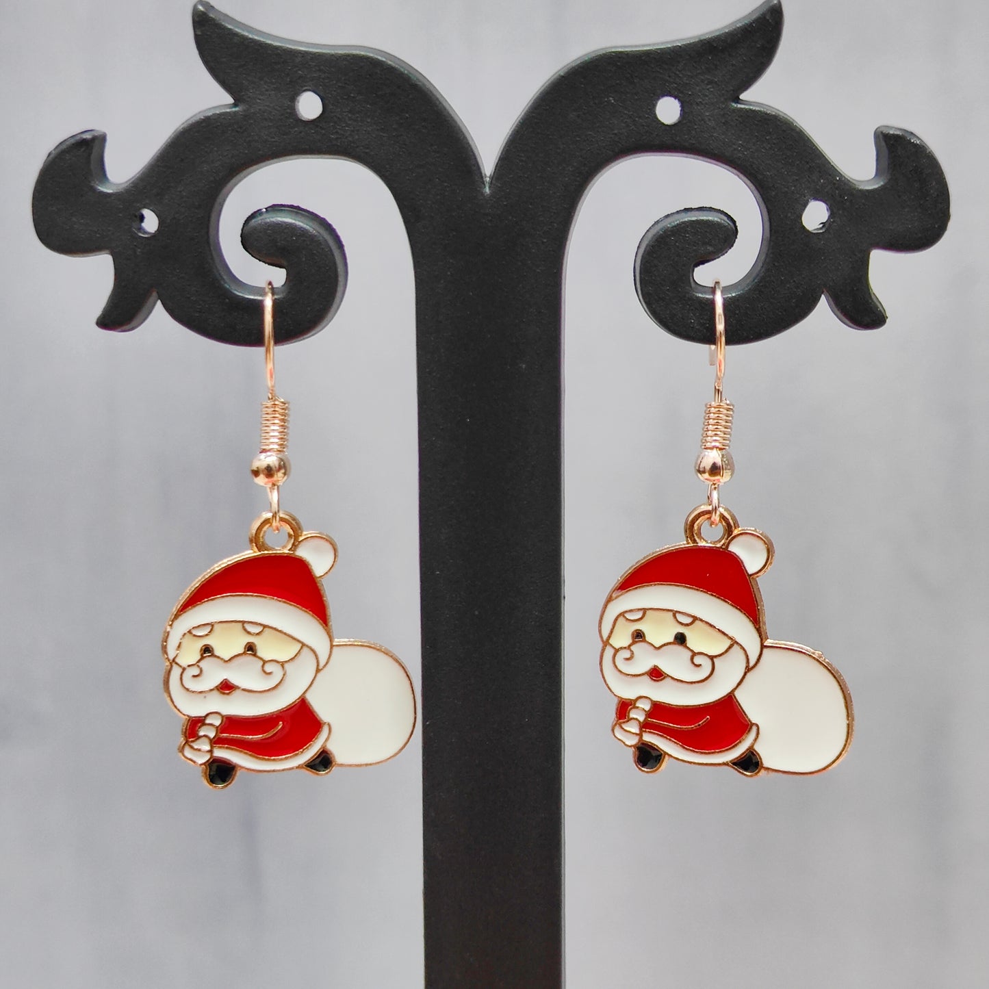 Sneaky Santa Rose Golden Christmas Earrings