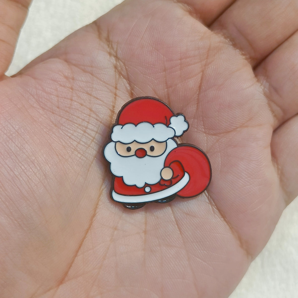 Cute Sneaky Santa Christmas Theme Enamel Pin