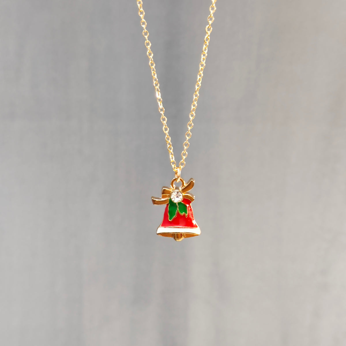 Studded Jingle Bell Golden Christmas Pendant Set (Necklace & Earrings)