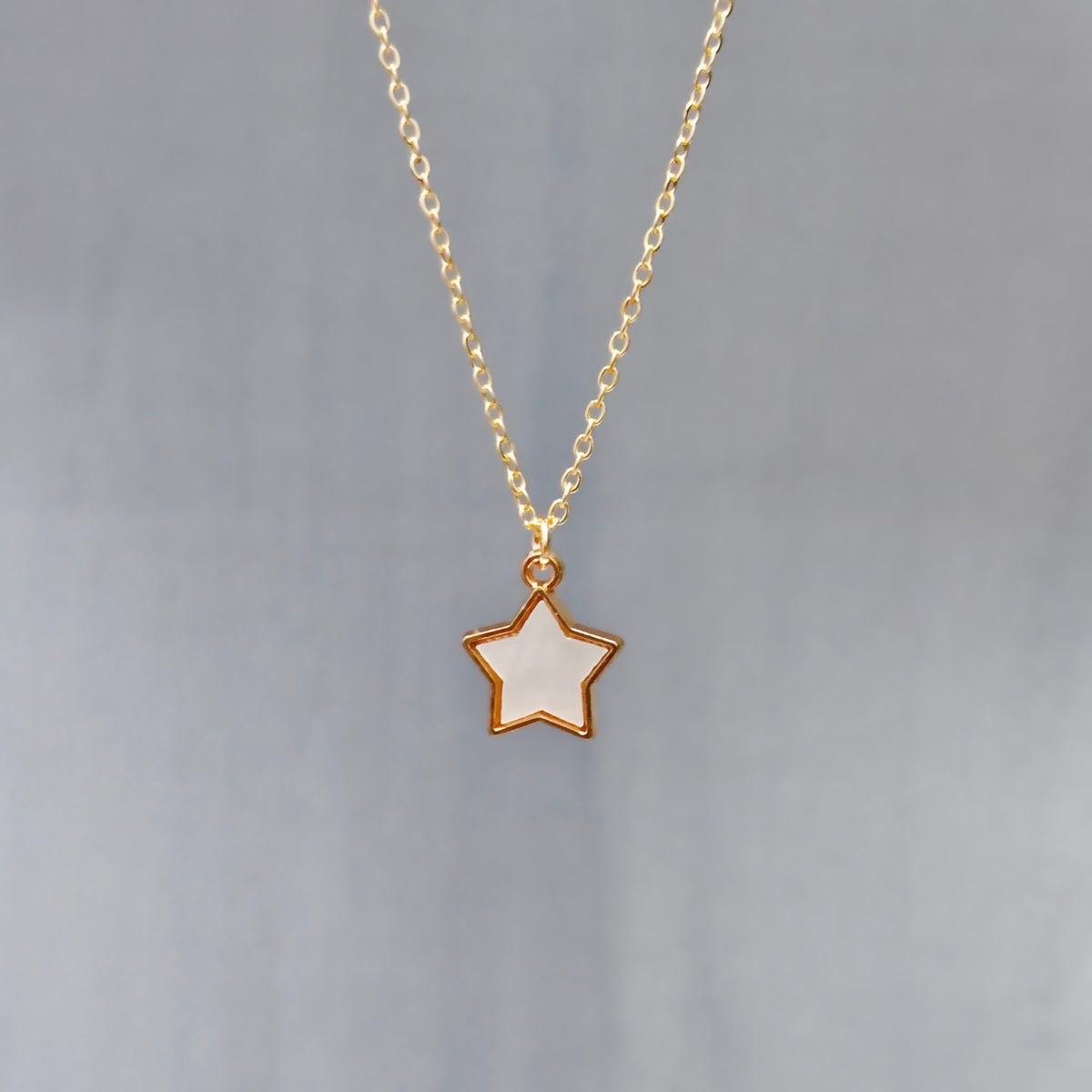 Pearl-Finish White Star Golden Christmas Charm Necklace