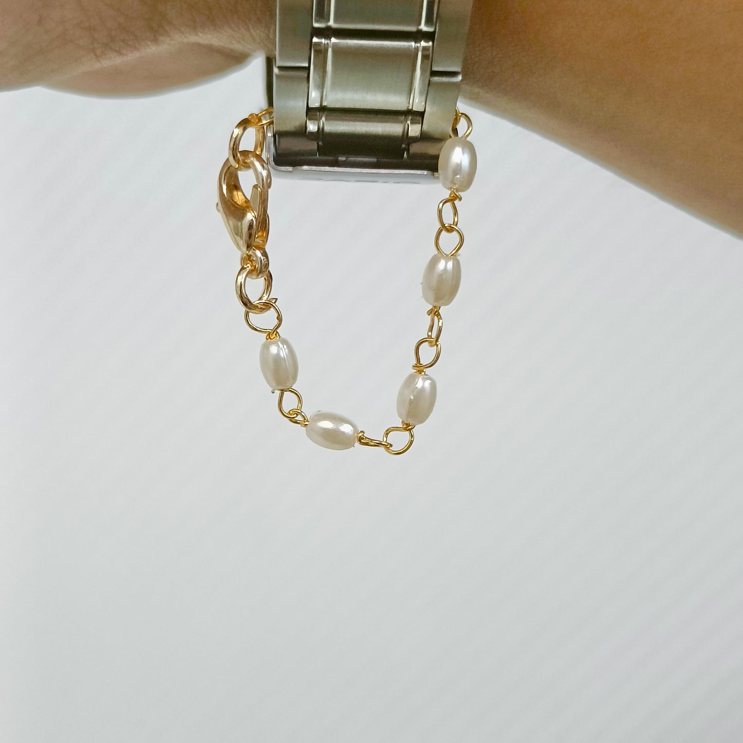 Golden Oval Pearl Knotting Chain Plain Watch Charm